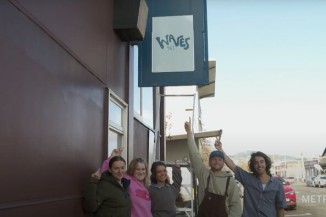 waves staff with sign