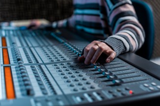 mixing board with hands